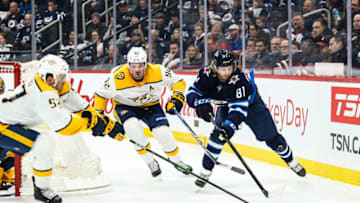 Feb 4, 2020; Winnipeg, Manitoba, CAN; Winnipeg Jets forward Kyle Connor (81) skates away from Nashville Predators forward Ryan Johansen (92) during the second period period at Bell MTS Place. Mandatory Credit: Terrence Lee-USA TODAY Sports