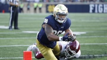 SOUTH BEND, IN - SEPTEMBER 02: Alize Mack #86 of the Notre Dame Fighting Irish gets tackled short of the goal line in the fourth quarter of a game against the Temple Owls at Notre Dame Stadium on September 2, 2017 in South Bend, Indiana. The Irish won 49-16. (Photo by Joe Robbins/Getty Images)