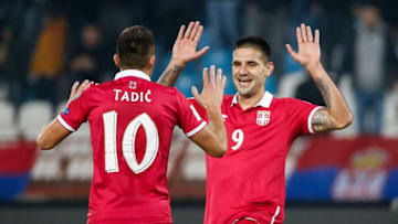 BELGRADE, SERBIA - OCTOBER 09: Aleksandar Mitrovic (R) celebrate scoring a goal with the Dusan Tadic (L) of Serbia during the FIFA 2018 World Cup Qualifier between Serbia and Austria at stadium Rajko Mitic on October 9, 2016 in Belgrade, . (Photo by Srdjan Stevanovic/Getty Images)