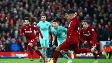 LIVERPOOL, ENGLAND - DECEMBER 29: Roberto Firmino of Liverpool scores his sides fifth goal during the Premier League match between Liverpool FC and Arsenal FC at Anfield on December 29, 2018 in Liverpool, United Kingdom. (Photo by Clive Brunskill/Getty Images)