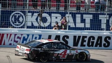 Mar 8, 2015; Las Vegas, NV, USA; Sprint Cup Series driver Kevin Harvick (4) performs a burn out after winning the Kobalt 400 at Las Vegas Motor Speedway. Mandatory Credit: Jerome Miron-USA TODAY Sports