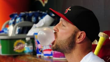 Oct 2, 2016; St. Louis, MO, USA; St. Louis Cardinals left fielder Matt Holliday (7) blows a bubble as he sits on the bench after he is removed from the game during the ninth inning against the Pittsburgh Pirates at Busch Stadium. The Cardinals won 10-4. Mandatory Credit: Jeff Curry-USA TODAY Sports