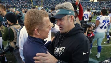 PHILADELPHIA, PA - JANUARY 01: Head coach Jason Garrett of the Dallas Cowboys, left, shakes hands with head coach Doug Pederson of the Philadelphia Eagles after a game at Lincoln Financial Field on January 1, 2017 in Philadelphia, Pennsylvania. The Eagles defeated the Cowboys 27-13. (Photo by Rich Schultz/Getty Images)