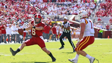 NORMAN, OK - OCTOBER 07: Quarterback Baker Mayfield #6 of the Oklahoma Sooners gets around linebacker Joel Lanning #7 of the Iowa State Cyclones at Gaylord Family Oklahoma Memorial Stadium on October 7, 2017 in Norman, Oklahoma. (Photo by Brett Deering/Getty Images)