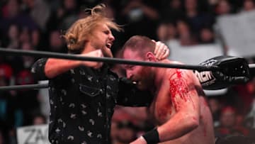 Feb 22, 2023; Phoenix, AZ, USA; Hangman Adam Page (left) and Jon Moxley during AEW Dynamite at Footprint Center. Mandatory Credit: Joe Camporeale-USA TODAY Sports