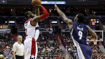 Dec 23, 2015; Washington, DC, USA; Washington Wizards guard John Wall (2) shoots the ball over Memphis Grizzlies forward Tony Allen (9) in the fourth quarter at Verizon Center. The Wizards won 100-91. Mandatory Credit: Geoff Burke-USA TODAY Sports