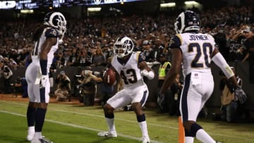 OAKLAND, CA - SEPTEMBER 10: John Johnson #43 of the Los Angeles Rams celebrates after intercepting a pass intended for Jared Cook #87 of the Oakland Raiders in the endzone during their NFL game at Oakland-Alameda County Coliseum on September 10, 2018 in Oakland, California. (Photo by Ezra Shaw/Getty Images)