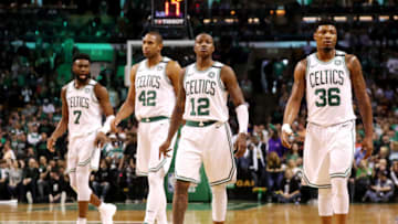 BOSTON, MA - MAY 13: Jaylen Brown #7, Al Horford #42, Terry Rozier #12 and Marcus Smart #36 of the Boston Celtics walk back on the court after a timeout against the Cleveland Cavaliers during the second quarter in Game One of the Eastern Conference Finals of the 2018 NBA Playoffs at TD Garden on May 13, 2018 in Boston, Massachusetts. (Photo by Maddie Meyer/Getty Images)