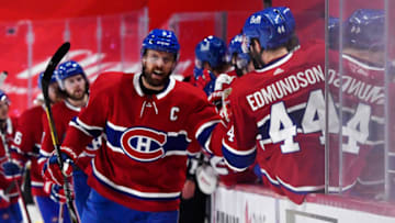 Jun 24, 2021; Montreal, Quebec, CAN; Montreal Canadiens defenseman Shea Weber (6) celebrates with teammates after scoring a goal against the Vegas Golden Knights during the first period in game six of the 2021 Stanley Cup Semifinals at the Bell Centre. Mandatory Credit: Eric Bolte-USA TODAY Sports