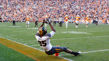 KNOXVILLE, TN - NOVEMBER 10: Marcus Lucas #85 of the Missouri Tigers catches an 18-yard touchdown pass in the second overtime against the Tennessee Volunteers during the game at Neyland Stadium on November 10, 2012 in Knoxville, Tennessee. Missouri won 51-48 in four overtimes. (Photo by Joe Robbins/Getty Images)