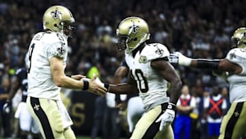 Sep 11, 2016; New Orleans, LA, USA; New Orleans Saints quarterback Drew Brees (9) and wide receiver Brandin Cooks (10) celebrate after a touchdown during the second quarter of a game against the Oakland Raiders at the Mercedes-Benz Superdome. Mandatory Credit: Derick E. Hingle-USA TODAY Sports