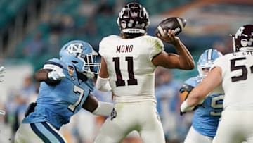 Auburn footballJan 2, 2021; Miami Gardens, FL, USA; North Carolina Tar Heels linebacker Eugene Asante (7) goes after Texas A&M Aggies quarterback Kellen Mond (11) during the first half at Hard Rock Stadium. Mandatory Credit: Jasen Vinlove-USA TODAY Sports
