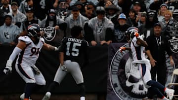 OAKLAND, CA - NOVEMBER 26: Michael Crabtree No. 15 of the Oakland Raiders fights with Aqib Talib No. 21 of the Denver Broncos during the first quarter their NFL football game at Oakland-Alameda County Coliseum on November 26, 2017 in Oakland, California. Both Crabtree and Talib were disqualified after the incident(Photo by Stephen Lam/Getty Images)
