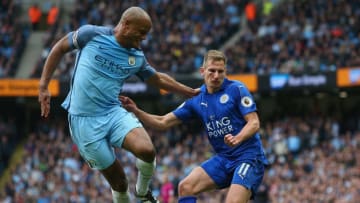 MANCHESTER, ENGLAND - MAY 13: Vincent Kompany of Manchester City and Marc Albrighton of Leicester City compete for the ball during the Premier League match between Manchester City and Leicester City at Etihad Stadium on May 13, 2017 in Manchester, England. (Photo by Alex Livesey/Getty Images)