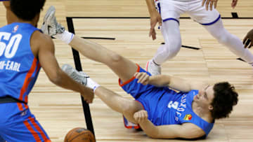 Josh Giddey #3 of the Oklahoma City Thunder injures his ankle as he get tripped up driving against the Detroit Pistons during the 2021 NBA Summer League at the Thomas & Mack Center on August 8, 2021 in Las Vegas, Nevada. The Thunder defeated the Pistons 76-72. NOTE TO USER: User expressly acknowledges and agrees that, by downloading and or using this photograph, User is consenting to the terms and conditions of the Getty Images License Agreement. (Photo by Ethan Miller/Getty Images)