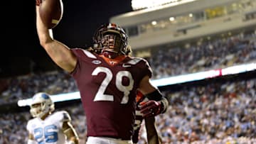 CHAPEL HILL, NC - OCTOBER 13: Dalton Keene #29 of the Virginia Tech Hokies reacts after scoring the game-winning touchdown against the North Carolina Tar Heels during their game at Kenan Stadium on October 13, 2018 in Chapel Hill, North Carolina. Virginia Tech won 22-19. (Photo by Grant Halverson/Getty Images)