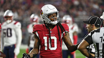 GLENDALE, ARIZONA - DECEMBER 12: DeAndre Hopkins #10 of the Arizona Cardinals reacts to a penalty call against the New England Patriots at State Farm Stadium on December 12, 2022 in Glendale, Arizona. (Photo by Norm Hall/Getty Images)