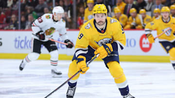 Filip Forsberg #9 of the Nashville Predators skates with the puck against the Chicago Blackhawks during the third period at United Center on December 21, 2022 in Chicago, Illinois. (Photo by Michael Reaves/Getty Images)