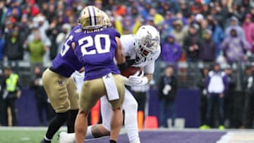 SEATTLE, WASHINGTON - OCTOBER 19: Spencer Webb #18 of the Oregon Ducks scores a 12 yard touchdown catch against the Washington Huskies in the first quarter during their game at Husky Stadium on October 19, 2019 in Seattle, Washington. (Photo by Abbie Parr/Getty Images)