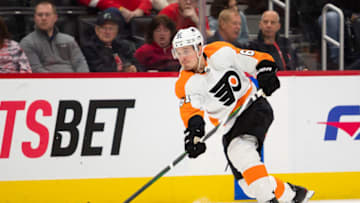 Feb 12, 2022; Detroit, Michigan, USA; Philadelphia Flyers defenseman Justin Braun (61) takes a shot during the third period against the Detroit Red Wings at Little Caesars Arena. Mandatory Credit: Raj Mehta-USA TODAY Sports