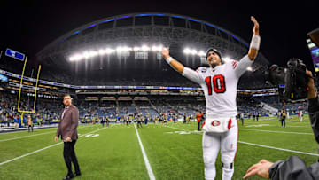 SEATTLE, WASHINGTON - DECEMBER 29: Jimmy Garoppolo #10 of the San Francisco 49ers celebrates after the game against the Seattle Seahawks at CenturyLink Field on December 29, 2019 in Seattle, Washington. The San Francisco 49ers top the Seattle Seahawks 26-21. (Photo by Alika Jenner/Getty Images)