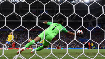 KAZAN, RUSSIA - JULY 06: Kevin De Bruyne of Belgium (not pictured) scores past Alisson of Brazil his team's second goal during the 2018 FIFA World Cup Russia Quarter Final match between Brazil and Belgium at Kazan Arena on July 6, 2018 in Kazan, Russia. (Photo by Laurence Griffiths/Getty Images)