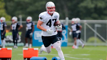FOXBOROUGH, MA - JULY 26: New England Patriots tight end Jacob Hollister (47) runs with the ball during Patriots Training Camp on July 26, 2018, at the Patriots Practice Facility at Gillette Stadium in Foxborough, Massachusetts. (Photo by Fred Kfoury III/Icon Sportswire via Getty Images)