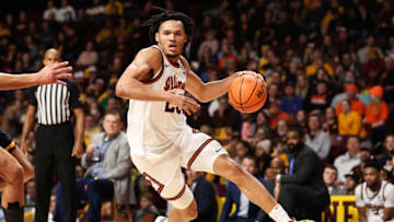 Jan 16, 2023; Minneapolis, Minnesota, USA; Illinois Fighting Illini forward Ty Rodgers (20) drives to the basket against the Minnesota Golden Gophers during the second half at Williams Arena. Mandatory Credit: Matt Krohn-USA TODAY Sports
