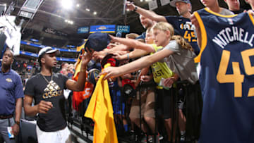SALT LAKE CITY, UT - JULY 5: Donovan Mitchell #45 of the Utah Jazz signs autographs after the game against the Atlanta Hawks on July 5, 2018 at Vivint Smart Home Arena in Salt Lake City, Utah. NOTE TO USER: User expressly acknowledges and agrees that, by downloading and/or using this photograph, user is consenting to the terms and conditions of the Getty Images License Agreement. Mandatory Copyright Notice: Copyright 2018 NBAE (Photo by Melissa Majchrzak/NBAE via Getty Images)