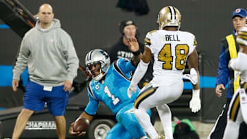 Nov 17, 2016; Charlotte, NC, USA; Carolina Panthers quarterback Cam Newton (1) gets hit late out of bounds by New Orleans Saints free safety Vonn Bell (48) in the second quarter at Bank of America Stadium. Mandatory Credit: Jeremy Brevard-USA TODAY Sports