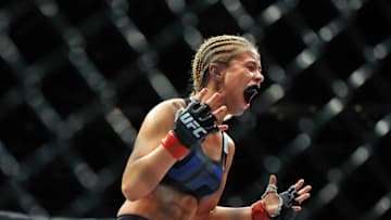 Aug 27, 2016; Vancouver, BC, Canada; PaigeVanzant (red gloves) reacts during her fight against BecRawlings (not pictured) during UFC Fight Night at Rogers Arena. Mandatory Credit: Anne-Marie Sorvin-USA TODAY Sports