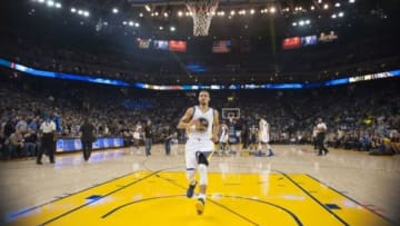 December 23, 2015; Oakland, CA, USA; Golden State Warriors guard Stephen Curry (30) runs to the basket during his pre-game routine before the game against the Utah Jazz at Oracle Arena. The Warriors defeated the Jazz 103-85. Mandatory Credit: Kyle Terada-USA TODAY Sports