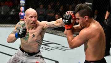 GDANSK, POLAND - OCTOBER 21: (L-R) Josh Emmett punches Felipe Arantes of Brazil in their featherweight bout during the UFC Fight Night event inside Ergo Arena on October 21, 2017 in Gdansk, Poland. (Photo by Jeff Bottari/Zuffa LLC/Zuffa LLC via Getty Images)