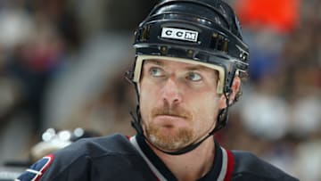 VANCOUVER - OCTOBER 11: Left wing Brad May #10 of the Vancouver Canucks looks on against the Edmonton Oilers during the NHL game on October 11, 2003 at General Motors Place in Vancouver, Canada. The Canucks defeated the Oilers 3-0. (Photo by Jeff Vinnick/Getty Images)