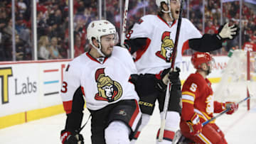 CALGARY, CANADA - FEBRUARY 27: Mika Zibanejad #65 of the Ottawa Senators celebrates his hat trick goal in the third period with Mike Hoffman #68 during their NHL game against the Calgary Flames at the Scotiabank Saddledome on February 27, 2016 in Calgary, Alberta, Canada. (Photo by Tom Szczerbowski/Getty Images)
