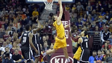 Mar 31, 2016; Cleveland, OH, USA; Cleveland Cavaliers center Timofey Mozgov (20) makes a reverse layup in the second quarter against the Brooklyn Nets at Quicken Loans Arena. Mandatory Credit: David Richard-USA TODAY Sports