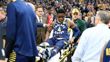 INDIANAPOLIS, INDIANA - JANUARY 23: Victor Oladipo #4 of the Indiana Pacers is taken off of the court on a stretcher after being injured in the second quarter of the game against the Toronto Raptors at Bankers Life Fieldhouse on January 23, 2019 in Indianapolis, Indiana. (Photo by Andy Lyons/Getty Images)