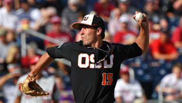 Omaha, NE - JUNE 26: Pitcher Luke Heimlich #15 of the Oregon State Beavers delivers a pitch in the first inning during game one of the College World Series Championship Series against the Arkansas Razorbacks on June 26, 2018 at TD Ameritrade Park in Omaha, Nebraska. (Photo by Peter Aiken/Getty Images)