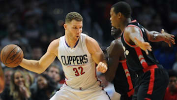 November 21, 2016; Los Angeles, CA, USA; Los Angeles Clippers forward Blake Griffin (32) moves the ball against the Toronto Raptors defense during the first half at Staples Center. Mandatory Credit: Gary A. Vasquez-USA TODAY Sports