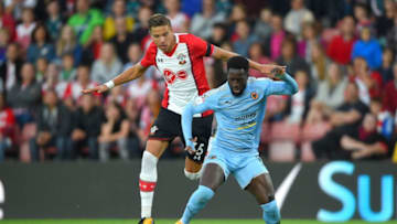 SOUTHAMPTON, ENGLAND - AUGUST 23: Jan Bednarek of Southampton and Nouha Dicko of Wolverhampton Wanderers battle for possession during the Carabao Cup Second Round match between Southampton and Wolverhampton Wanderers at St Mary's Stadium on August 23, 2017 in Southampton, England. (Photo by Mike Hewitt/Getty Images)