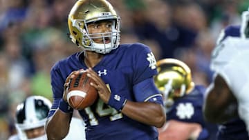 Sep 17, 2016; South Bend, IN, USA; Notre Dame Fighting Irish quarterback DeShone Kizer (14) attempts to throw the ball against the Michigan State Spartans during the first quarter of a game at Notre Dame Stadium. Mandatory Credit: Mike Carter-USA TODAY Sports