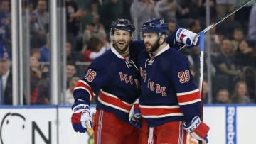 Mar 13, 2016; New York, NY, USA; New York Rangers center Derick Brassard (16) and right wing Jesper Fast (19) celebrate after goal against the Pittsburgh Penguins during the second period at Madison Square Garden. Mandatory Credit: Vincent Carchietta-USA TODAY Sports