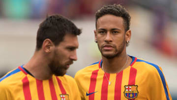 (FILES) This file photo taken on July 22, 2017 shows Neymar (R) and Lionel Messi (L) of FC Barcelona warming up before the International Champions Cup (ICC) match between Juventus FC and FC Barcelona at the Met Life Stadium in East Rutherford, New Jersey.One argument backing Neymar's decision to leave Barca on top of reportedly tripling his wages is to move out of Messi's shadow and compete to become the first Ballon d'Or winner outside of Messi and Ronaldo for a decade. / AFP PHOTO / DON EMMERT (Photo credit should read DON EMMERT/AFP via Getty Images)