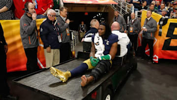 GLENDALE, AZ - JANUARY 01: Linebacker Jaylon Smith #9 of the Notre Dame Fighting Irish is carted off the field after an injury during the first quarter of the BattleFrog Fiesta Bowl against the Ohio State Buckeyes at University of Phoenix Stadium on January 1, 2016 in Glendale, Arizona. (Photo by Christian Petersen/Getty Images)