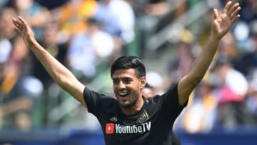 Carlos Vela of LAFC celebrates after scoring against LA Galaxy during their Major League Soccer (MLS) game at the StarHub Center in Los Angeles, California, on March 31, 2018.LA Galaxy went on to win 4-3 with two goals from Ibrahimovic. / AFP PHOTO / Mark RALSTON (Photo credit should read MARK RALSTON/AFP/Getty Images)