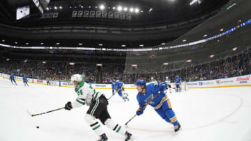 ST. LOUIS, MO - MARCH 02: Dallas Stars leftwing Roope Hintz (24) and St. Louis Blues center Robert Thomas (18) go after a loose puck during an NHL game between the Dallas Stars and the St. Louis Blues on March 02, 2019, at Energizer Center, St. Louis, MO. (Photo by Keith Gillett/Icon Sportswire via Getty Images)