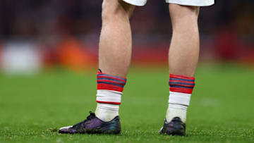 LONDON, ENGLAND - DECEMBER 21: A detailed view of the lower legs of Emile Smith Rowe of Arsenal during the Carabao Cup Quarter Final match between Arsenal and Sunderland at Emirates Stadium on December 21, 2021 in London, England. (Photo by Julian Finney/Getty Images)