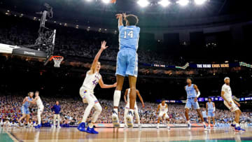 Apr 4, 2022; New Orleans, LA, USA; North Carolina Tar Heels guard Puff Johnson (14) shoots the ball agains tKansas Jayhawks forward Mitch Lightfoot (44) during the 2022 NCAA men's basketball tournament Final Four championship game at Caesars Superdome. Mandatory Credit: Robert Deutsch-USA TODAY Sports