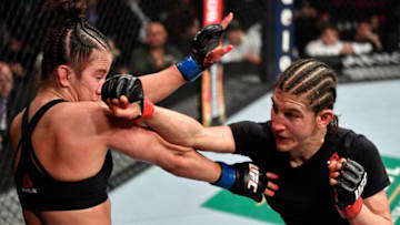 LAS VEGAS, NEVADA - JANUARY 18: (R-L) Roxanne Modafferi punches Maycee Barber in their flyweight fight during the UFC 246 event at T-Mobile Arena on January 18, 2020 in Las Vegas, Nevada. (Photo by Jeff Bottari/Zuffa LLC via Getty Images)