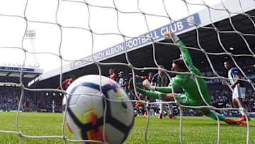 WEST BROMWICH, ENGLAND - APRIL 21: Danny Ings of Liverpool scores his sides first goal past Ben Foster of West Bromwich Albion during the Premier League match between West Bromwich Albion and Liverpool at The Hawthorns on April 21, 2018 in West Bromwich, England. (Photo by Laurence Griffiths/Getty Images)